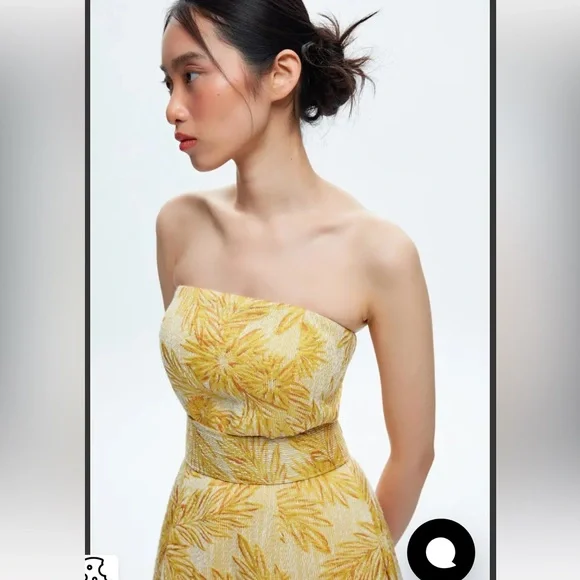 Yellow jacquard strapless gown